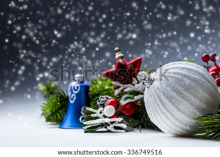 Christmas card with ball fir and decor on glittering background.