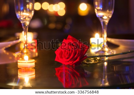 Romantic dinner setting.  Royalty-Free Stock Photo #336756848