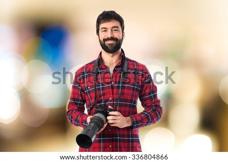 Photographer on unfocused background