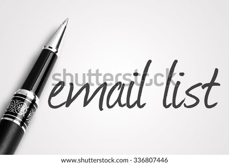 pen writes email list on white blank paper.