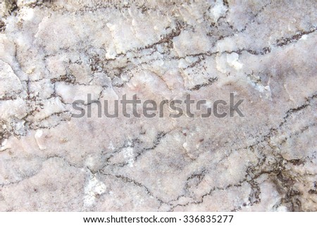 Marble patterned texture background. Surface of the marble with white tint 