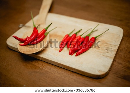 Red Hot Chili Peppers on  wooden background