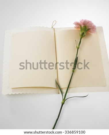 pink carnation and greeting card for Mother's day image