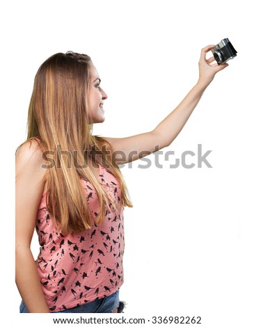 young woman taking a selfie on white background