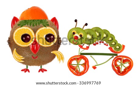 The little owl and a caterpillar on a bicycle made from vegetables and fruits