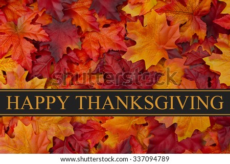 Happy Thanksgiving Greeting, Fall Leaves Background and text Happy Thanksgiving Royalty-Free Stock Photo #337094789