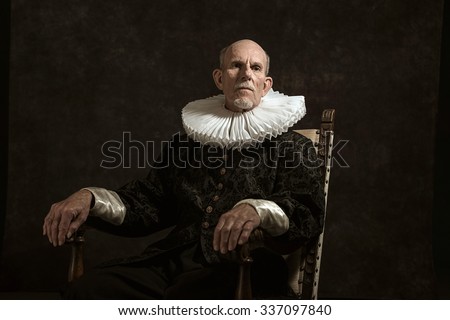 Official portrait of historical governor from the golden age. Sitting in chair. Studio shot against dark wall.