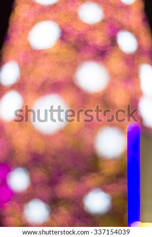 Blurry christmas tree with bokeh for light abstract background