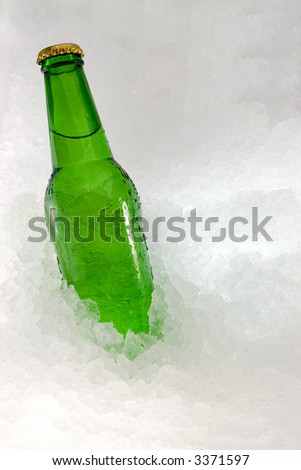 A nice picture of a beerbottle on ice. Very fresh. This version has no lemon. Green bottle