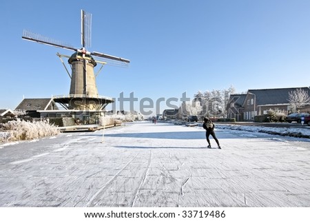 Ice skating on the canals in the countryside from the Netherlands