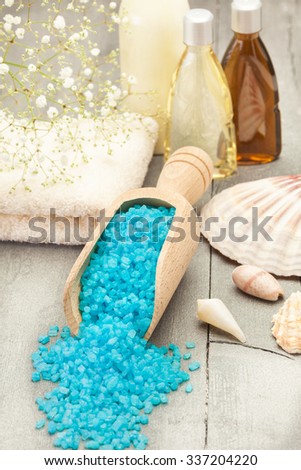 Photo of spa products over wooden table