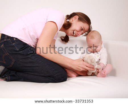 Family moments - Mother enjoying her cute baby