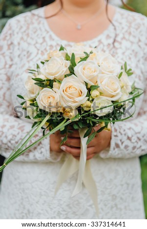Beautiful wedding bouquet in the bride's hands 