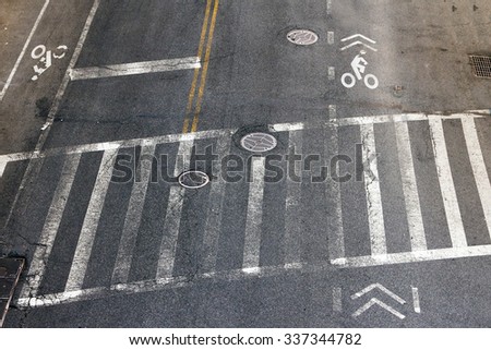 City street crosswalk and bike lanes in New York City