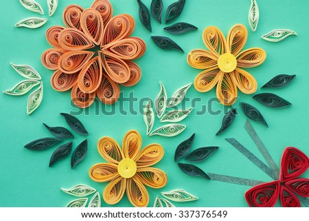 flowers made quilling on a light background Royalty-Free Stock Photo #337376549