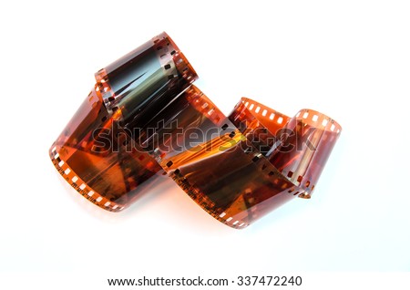 Heap of  35 mm film isolated on white background