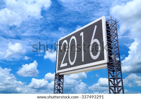 Happy new year 2016 on large sign board with blue sky background