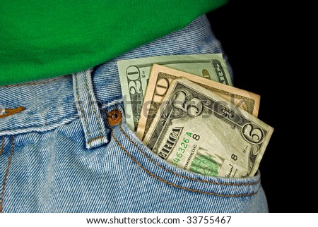 cash in front blue jean pocket