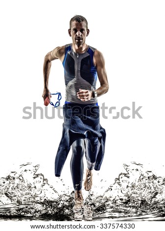man triathlon iron man athlete swimmers swimmers running in silhouette on white background