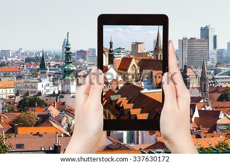 travel concept - tourist snapshot of old town Bratislava city on tablet pc