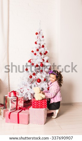 Happy child with Christmas gift 