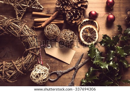 Making Christmas vintage decoration on wooden table