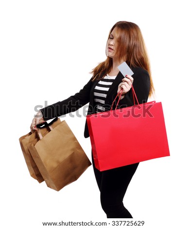 girl with a card and shopping bags