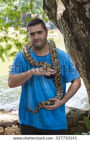 Tourist with snake