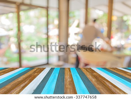 image of blurred coffee shop for background usage .