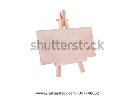 Easel with blank wooden panel in isolated and selective focus