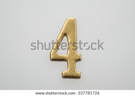 The Number 4, in the number alphabet set yellow gold color isolated on white background