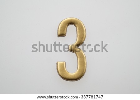The Number 3, in the number alphabet set yellow gold color isolated on white background