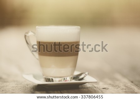 latte coffee or caffe latte on wooden table