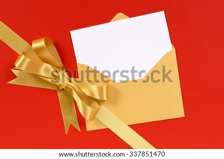 Gold Christmas card or invitation, gift ribbon bow, red background, diagonal