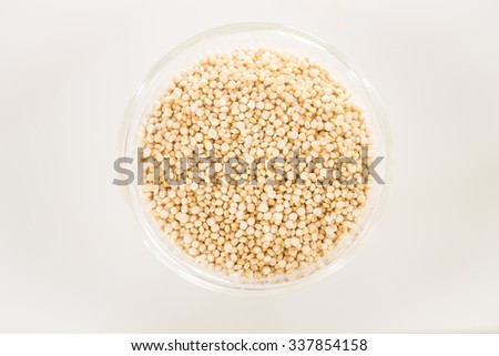 Raw organic white quinoa seeds, stock photo