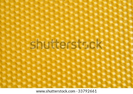 Close up structure of yellow honeycomb as background