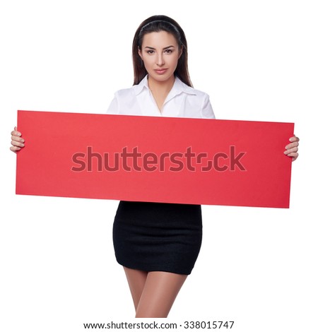 Confident businesswoman holding a red banner and smiling