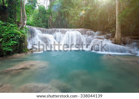 Deep forest waterfall at Huay Mae Kamin waterfall National Park Kanchanaburi Thailand