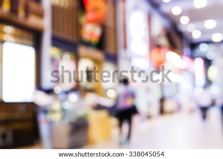 Abstract blur people shopping in department store, urban lifestyle concept