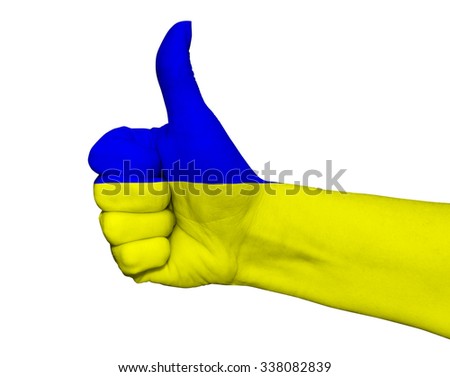 Hand with thumb up painted in colors of Ukraine flag isolated on white background
