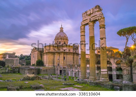 Roman forum ruins at dawn, artistic dark edit with temple columns and church of St Luca and Martina, long exposure with creamy purple sky