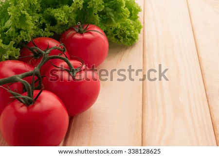 tomato green vegetables on table