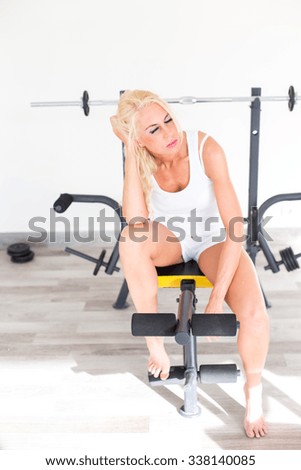 Fitness with young, blond woman