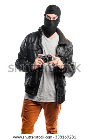 Robber photographing