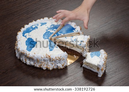 The symbol of war and separatism: a cake with a picture of the World is broken into pieces