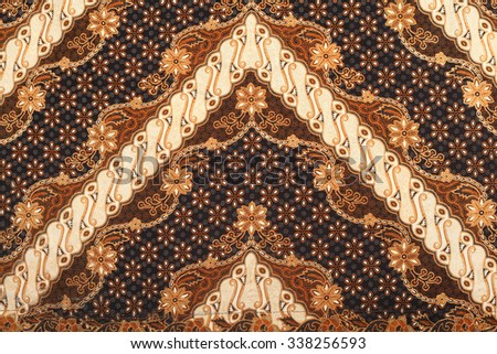 The beautiful of art Malaysian and Indonesian Batik Pattern Royalty-Free Stock Photo #338256593