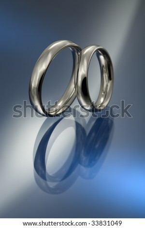 A pair of simple platinum wedding bands