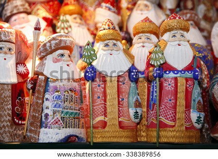 	Army of wooden santa claus puppets at christmas market