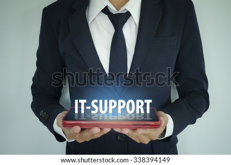 businessman holding tablet It-support , business concept , business idea 