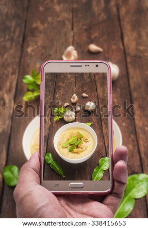 Image of shooting photographs with smartphone on curry still life tone